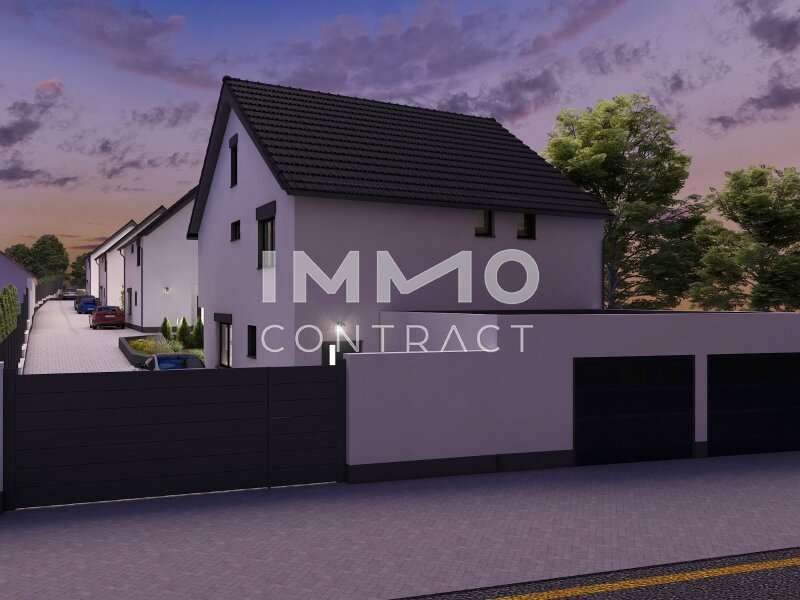 Einfamilienhaus Edelstal: Straßenansicht Haus 1 Dämmerung Straßenansicht Haus 1 Dämmerung