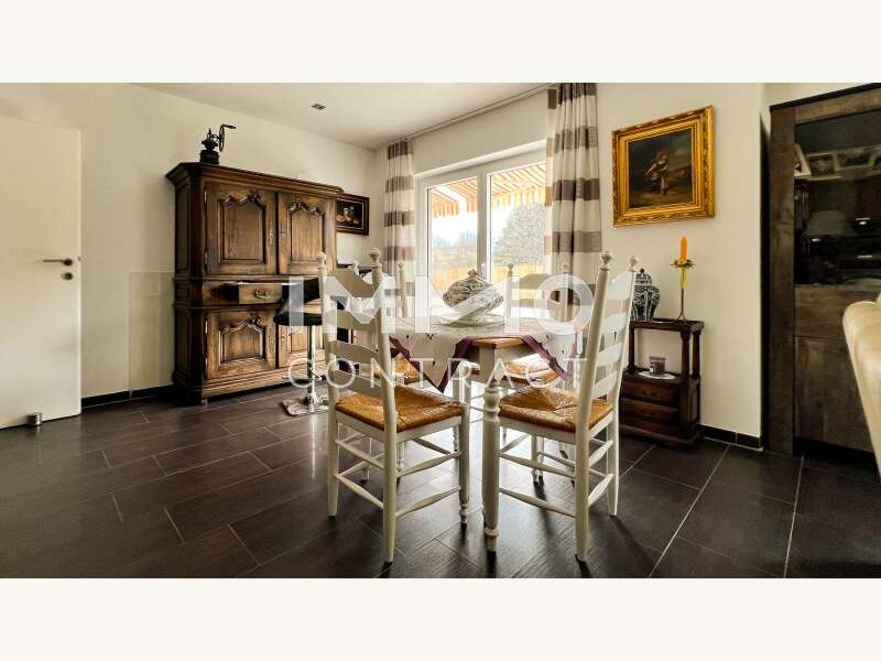 Mehrfamilienhaus Seeboden am Millstätter See: UG: Wohnzimmer - Esstisch und Zugang zu Terrasse und Garten UG: Wohnzimmer - Esstisch und Zugang zu Terrasse und Garten