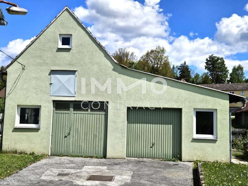 Haus Thaua: Ansicht Abstellraum mit Toren Ansicht Abstellraum mit Toren