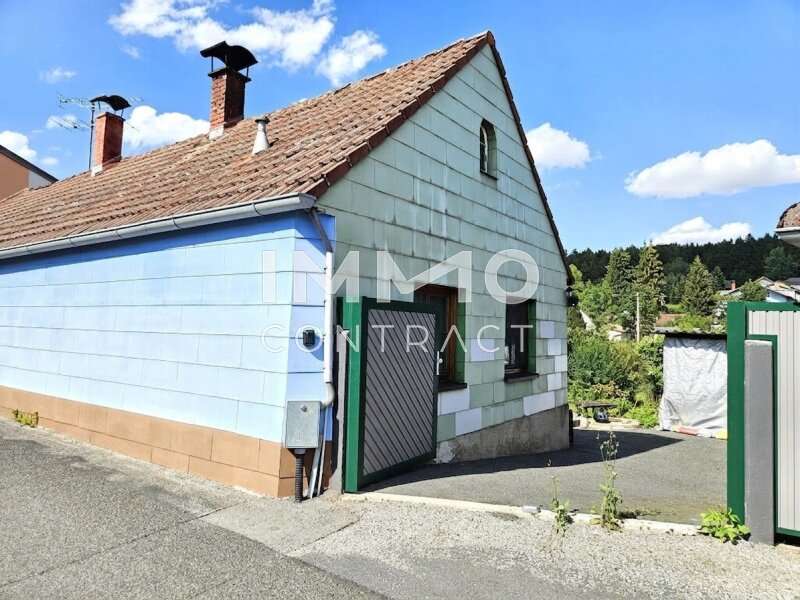 Haus Dietmanns: Ansicht Süden mit offenem Einfahrtstor Ansicht Süden mit offenem Einfahrtstor