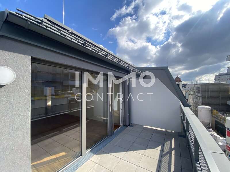 Dachterrasse mit Kirchturmblick