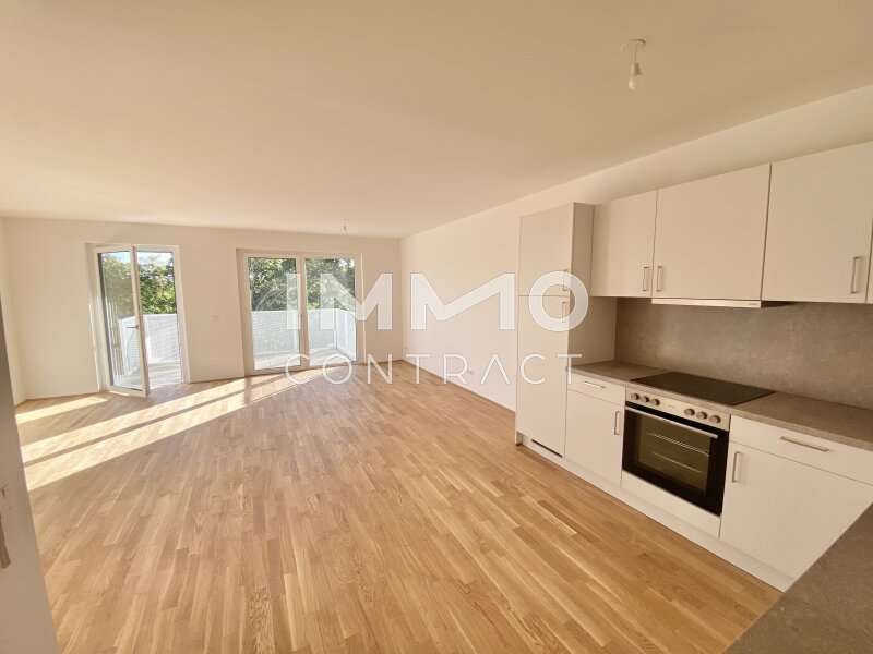 Wohnesszimmer mit Balkon