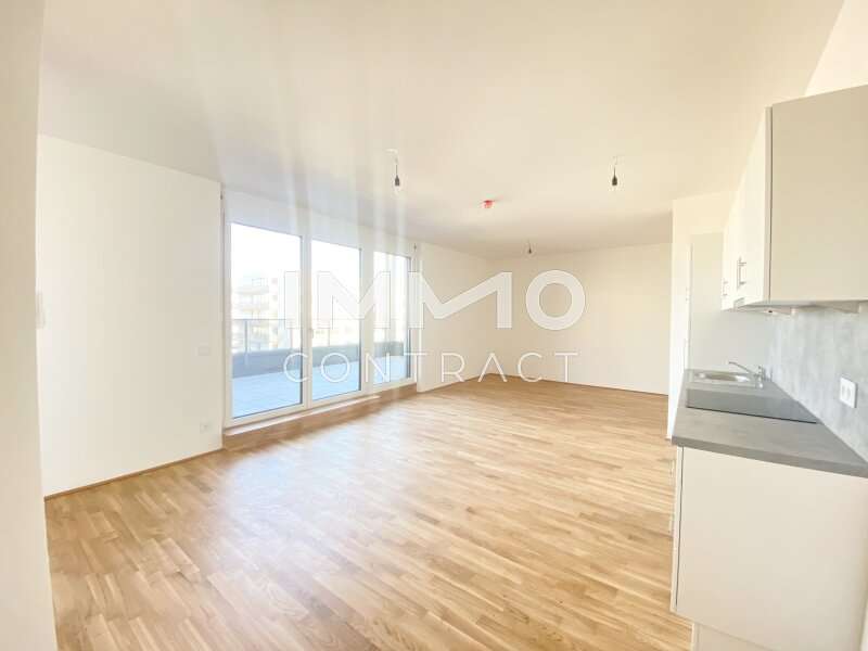 Wohnesszimmer mit Blick zur Terrasse