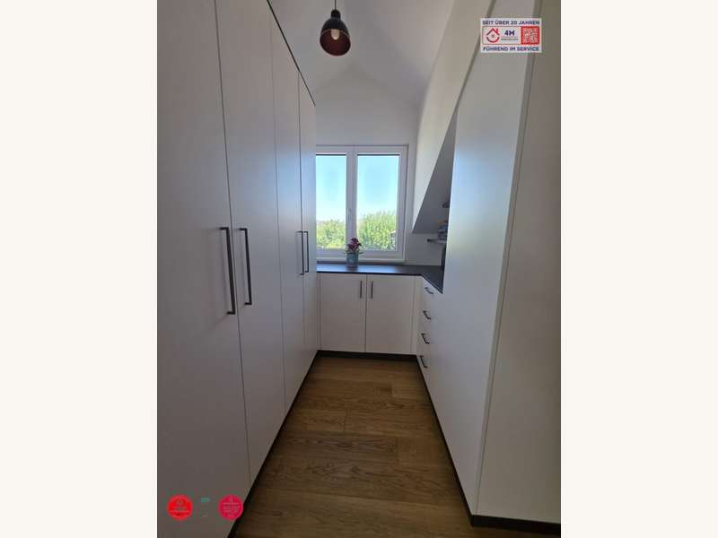 Einfamilienhaus Königstetten: Schrankraum Schrankraum