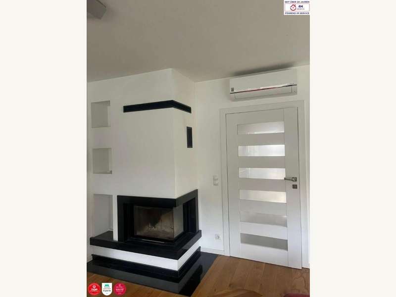 Einfamilienhaus Wien: Kamin Kamin