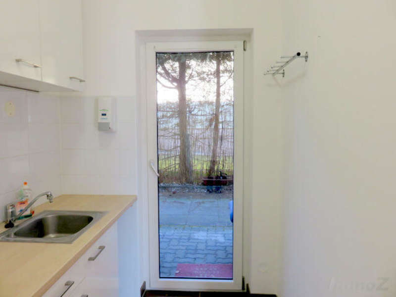 Küche mit Ausgang in den Garten/Terrasse