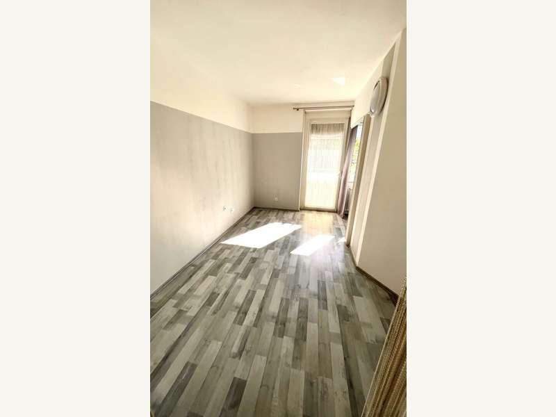 Wohnzimmer mit Ausgang auf die Loggia