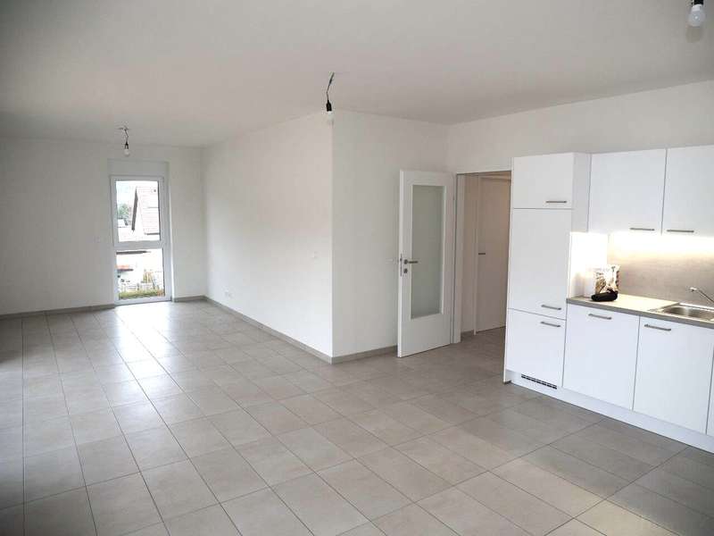 Penthouse Graz: Wohnzimmer mit offener Küche Wohnzimmer mit offener Küche