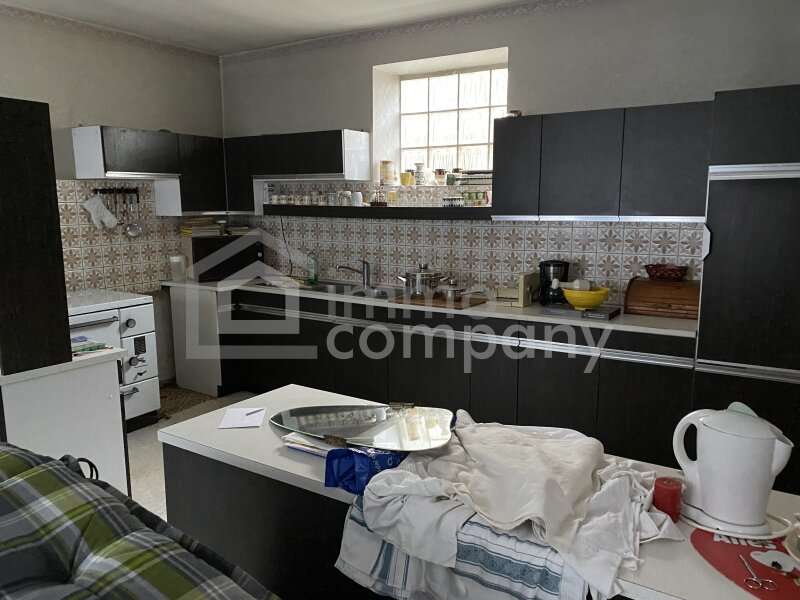 Bauernhaus Nickelsdorf: Küche mit Holzofen Küche mit Holzofen