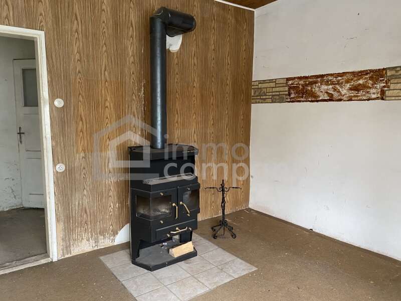 Einfamilienhaus Schwadorf: Kaminzimmer original Kaminzimmer original