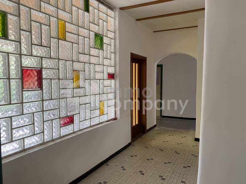 Einfamilienhaus Schwadorf: Gang zum Garten Gang zum Garten