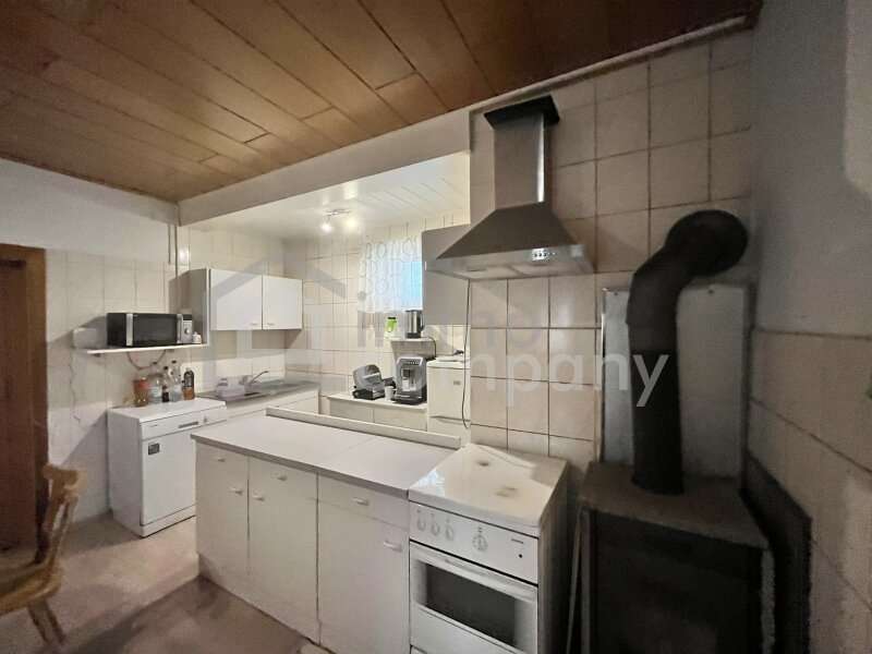 Bungalow Schwarzenbach: Küche mit Schwedenofen Küche mit Schwedenofen