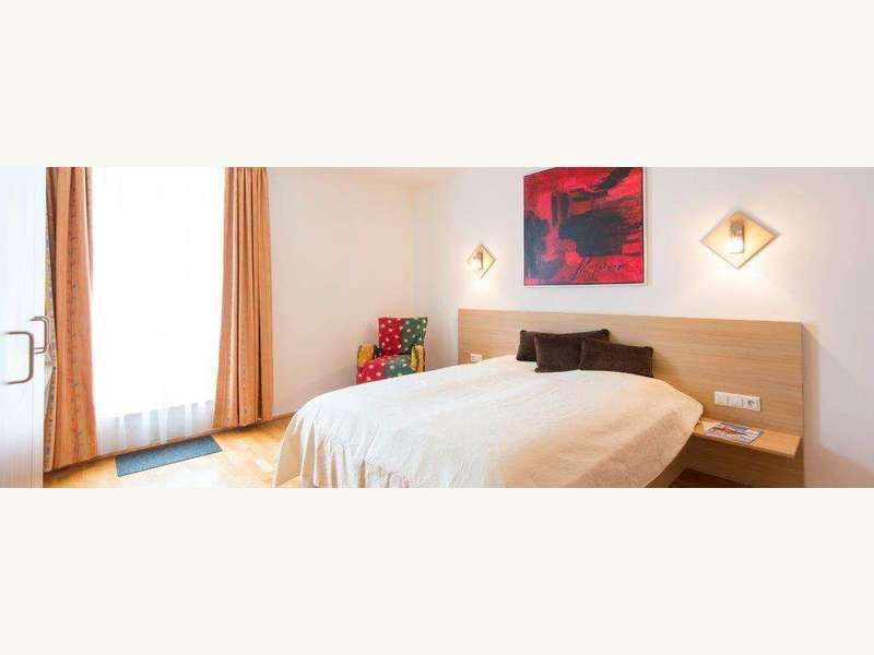 Schlafzimmer mit Balkon